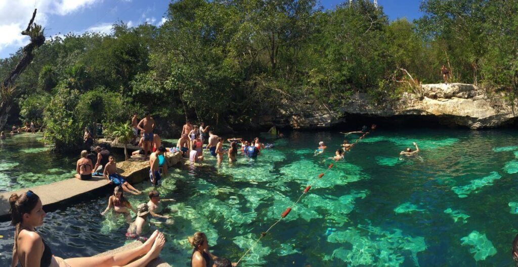 Traveler Enjoy the Cenote Azul in Tulum, Mexico